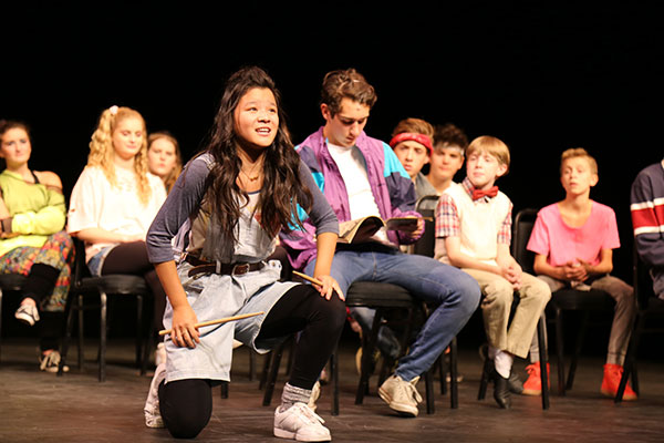 group of seated teens