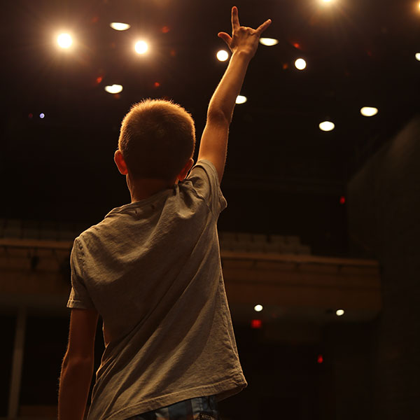 kid with raised hand