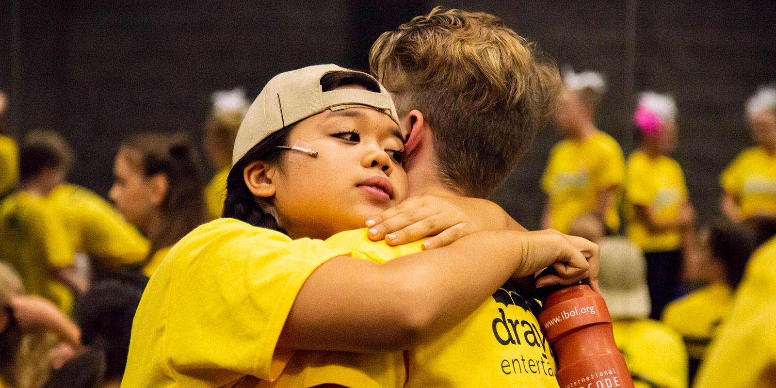 two students hugging