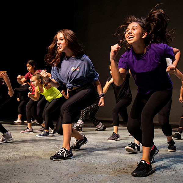 group of teens performing