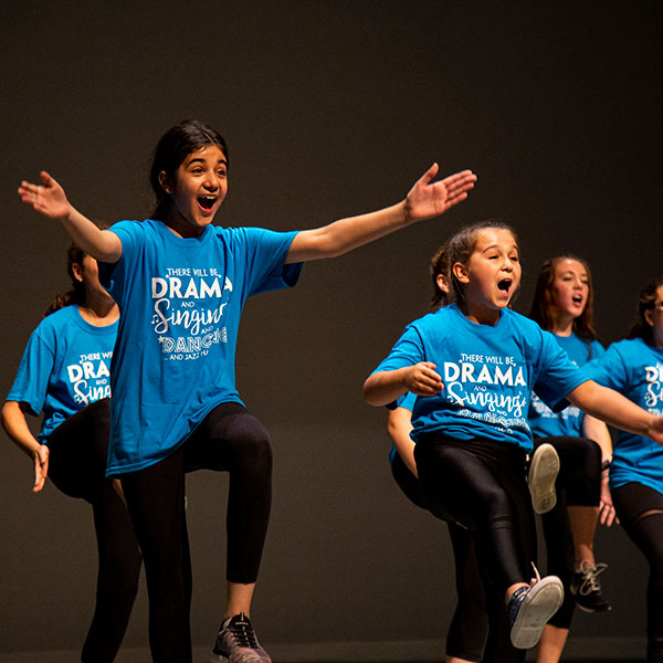 group of kids dancing