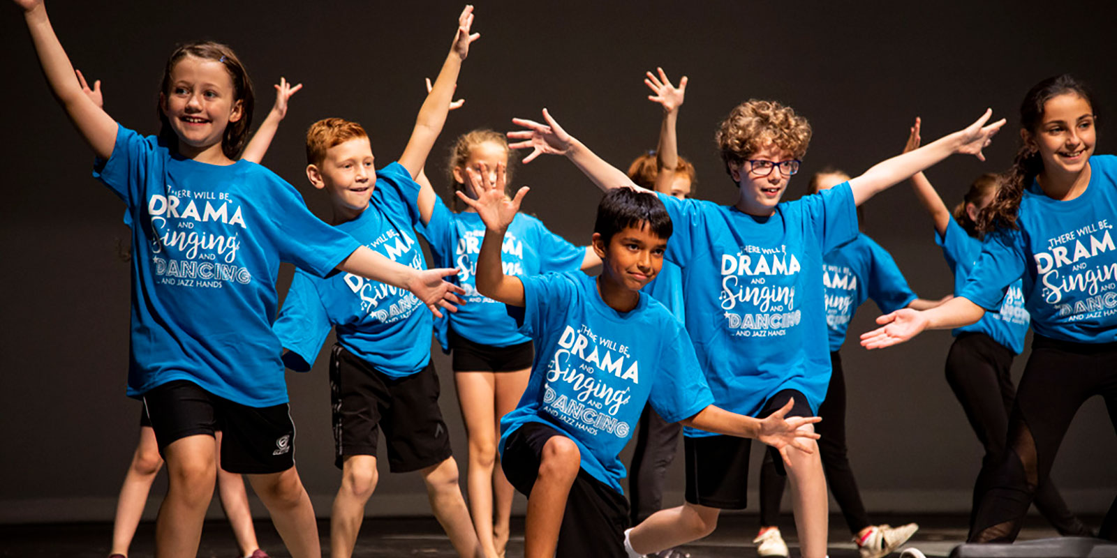 group of kids dancing