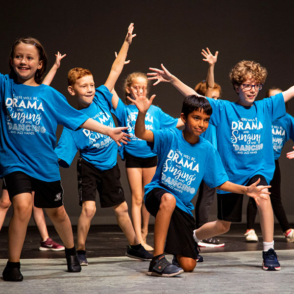 group of kids dancing