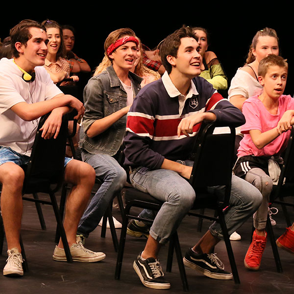 Group of seated teens