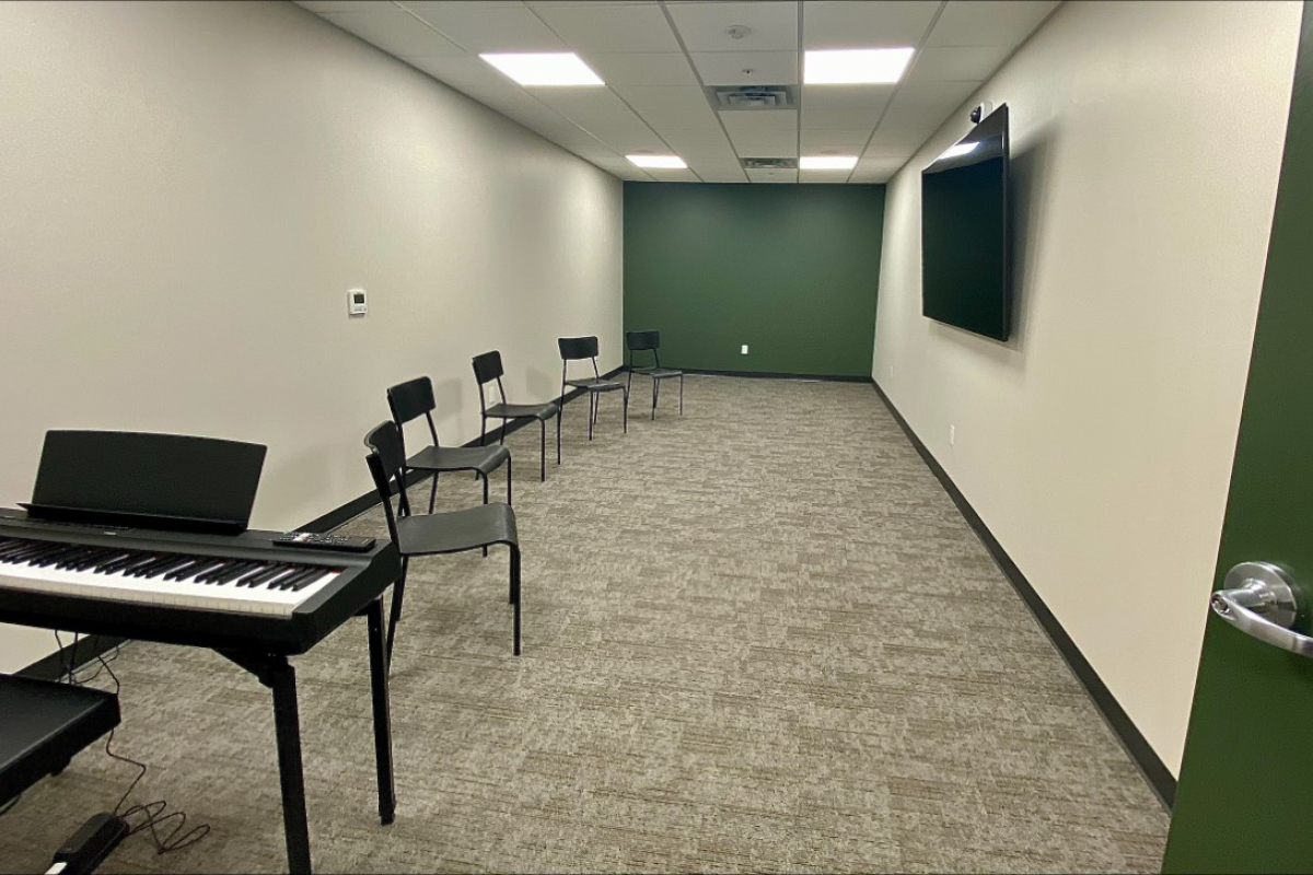 music roon with piano and chairs